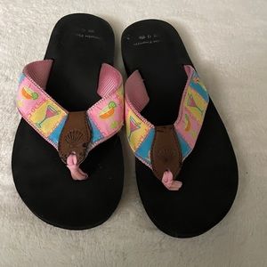 Women’s size 8 flip flops.